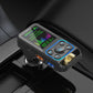 Wireless car FM MP3 transmitter in car with LCD screen and blue-lit control buttons