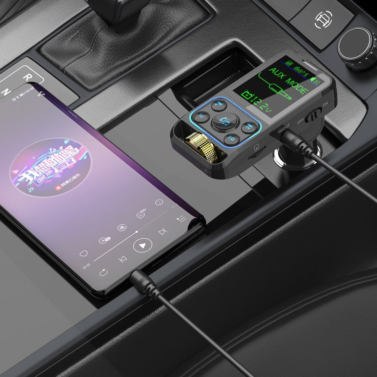 Wireless car FM MP3 transmitter with LCD screen and connected cable on console
