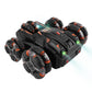 Black RC stunt car with orange trim and five treaded wheels, side view
