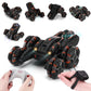 Black RC stunt car with orange accents shown with remote control and hands