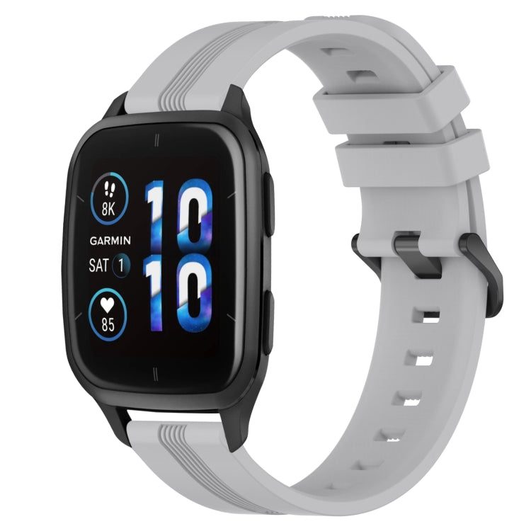 Concave striped silicone watch band in light gray with buckle, worn on a black smartwatch