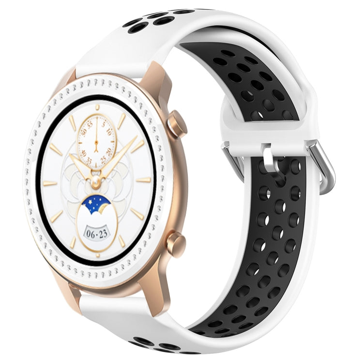White silicone watch band with perforations and black insert, secured with metal buckle