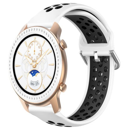 White silicone watch band with perforations and black insert, secured with metal buckle