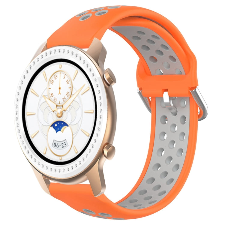 Orange perforated silicone watch band with gray panel and metal buckle for a smartwatch