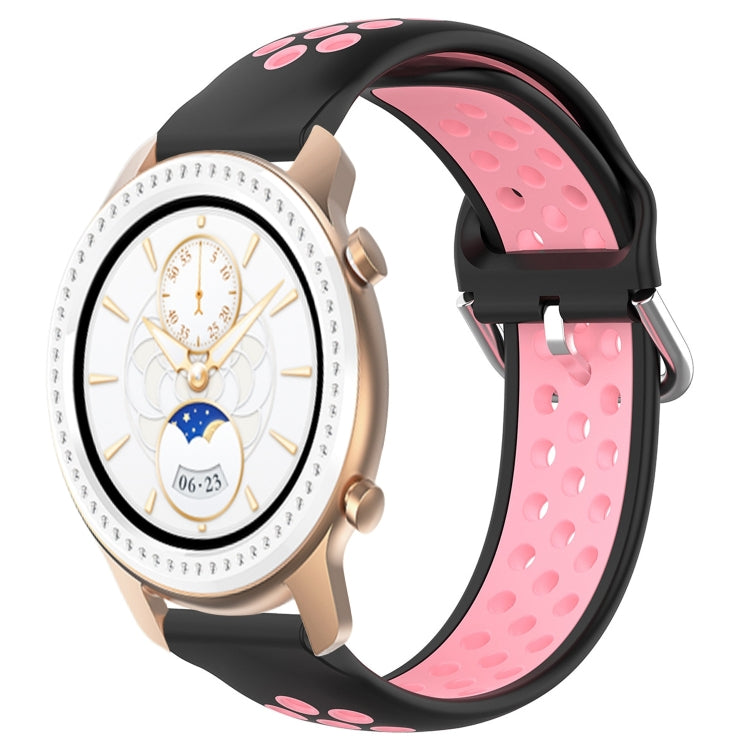Black silicone watch band with pink perforated inner panel and metal buckle