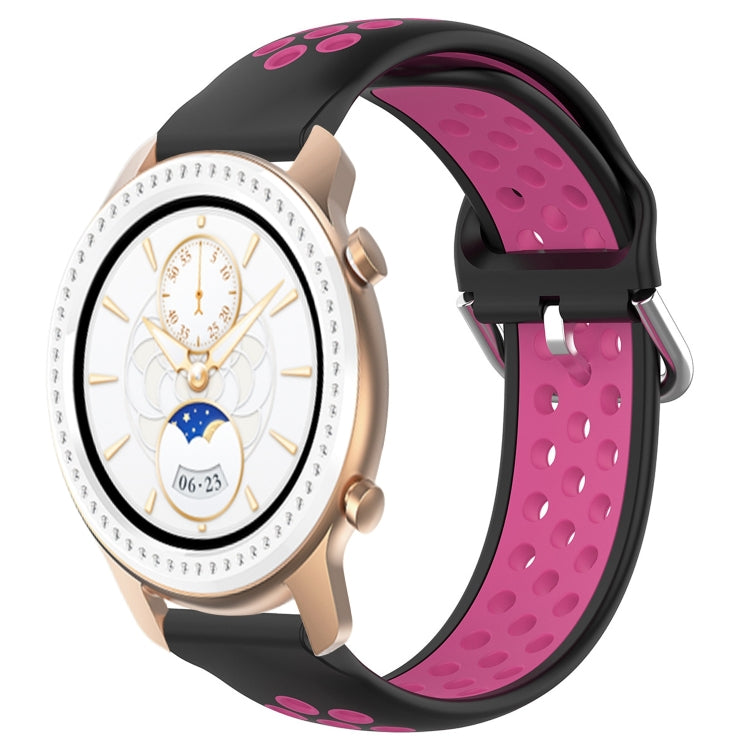 Black silicone watch band with bright pink perforated inner panel and metal buckle