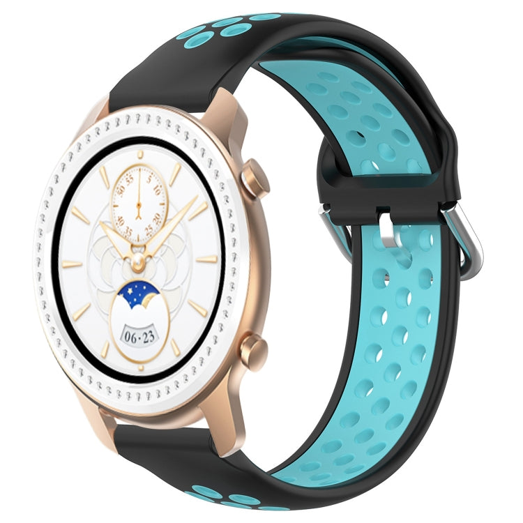Perforated sports silicone watch band, black with teal green underside, quick-snap clasp