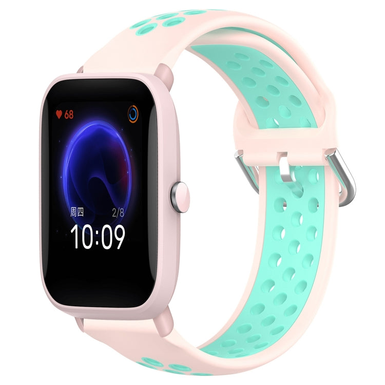 Perforated sports silicone watch band, light pink with turquoise underside, quick-snap clasp