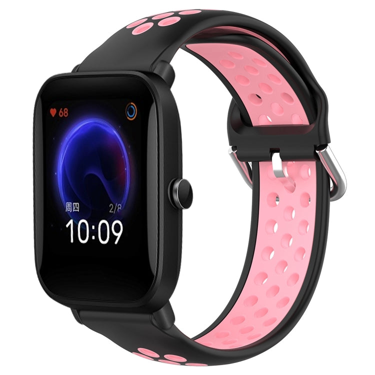 Perforated silicone sports watch band with black strap and pink perforations, watch shown