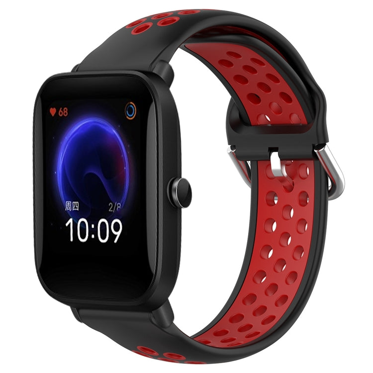 Perforated silicone sports watch band with black strap and red perforations, watch shown