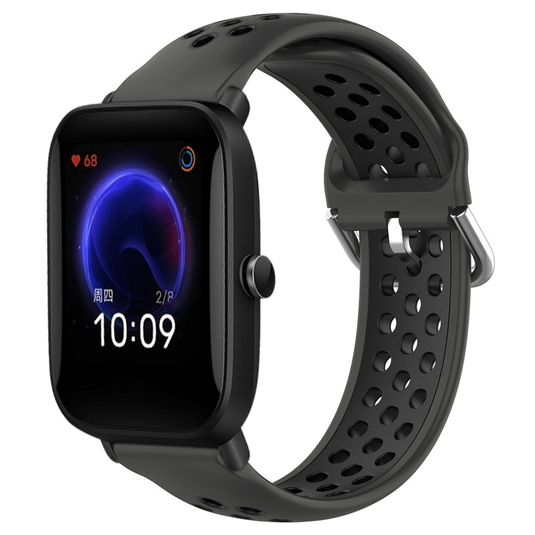 Perforated silicone sports watch band with black strap and dark gray perforations, watch shown