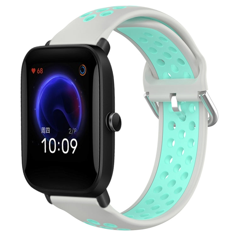 Perforated breathable silicone watch band with white and mint-green strap, black watch