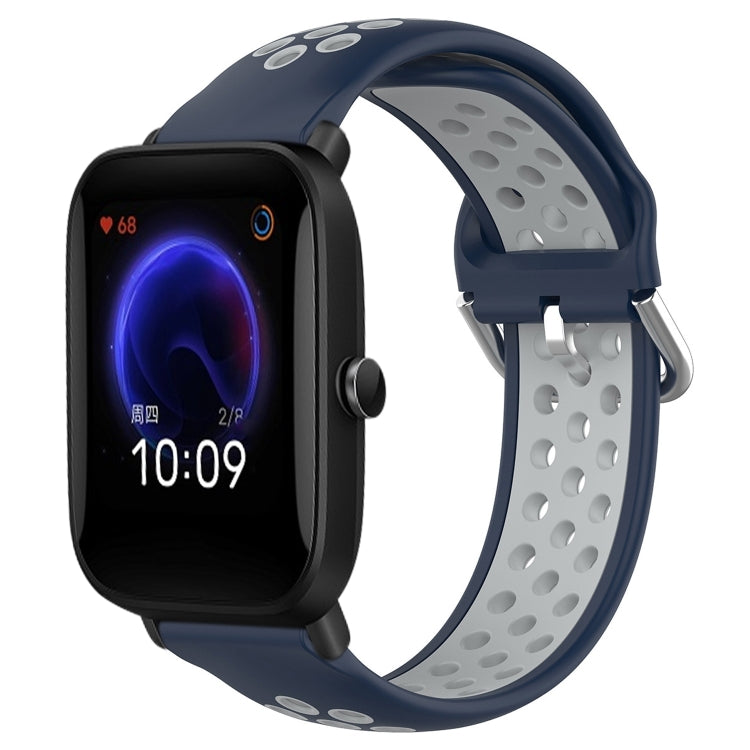 Perforated breathable silicone watch band with navy and light-gray strap, black watch