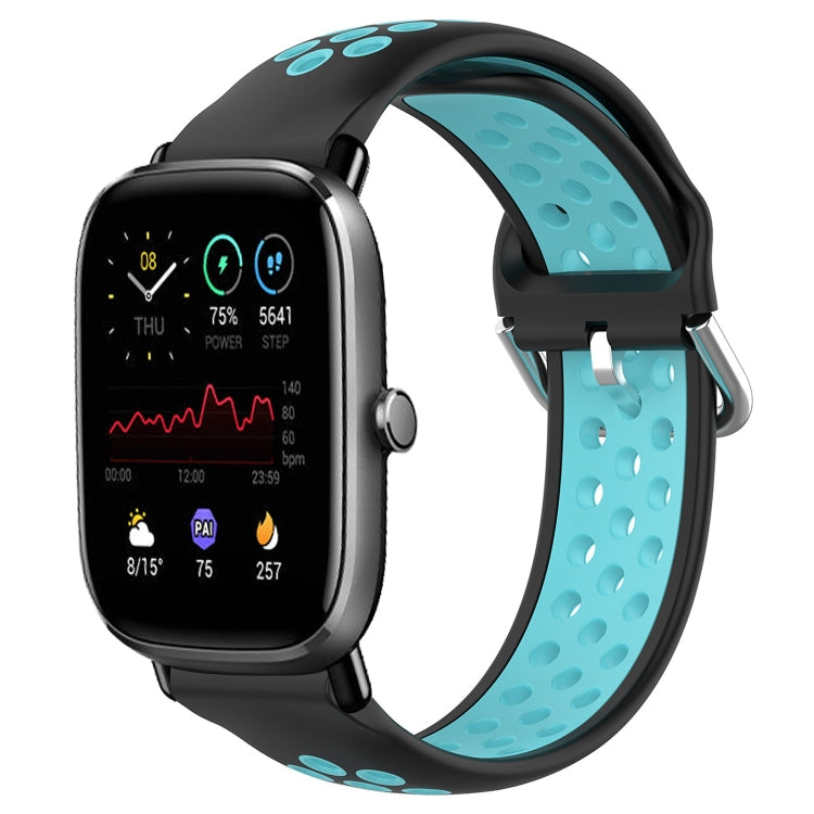 Silicone sports watch band with perforations, teal inner strap and black clasp