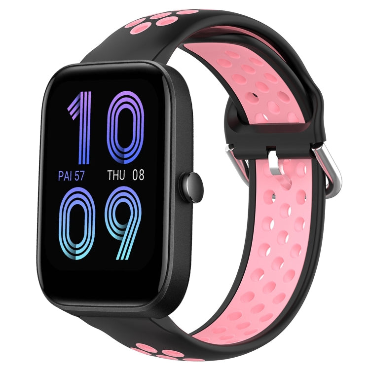 Black perforated silicone sports watch band with pink strap underside and metal buckle.