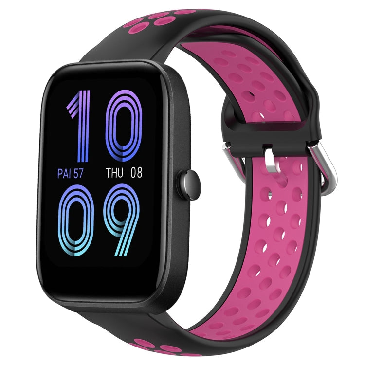 Black perforated silicone sports watch band with magenta strap underside and metal buckle.