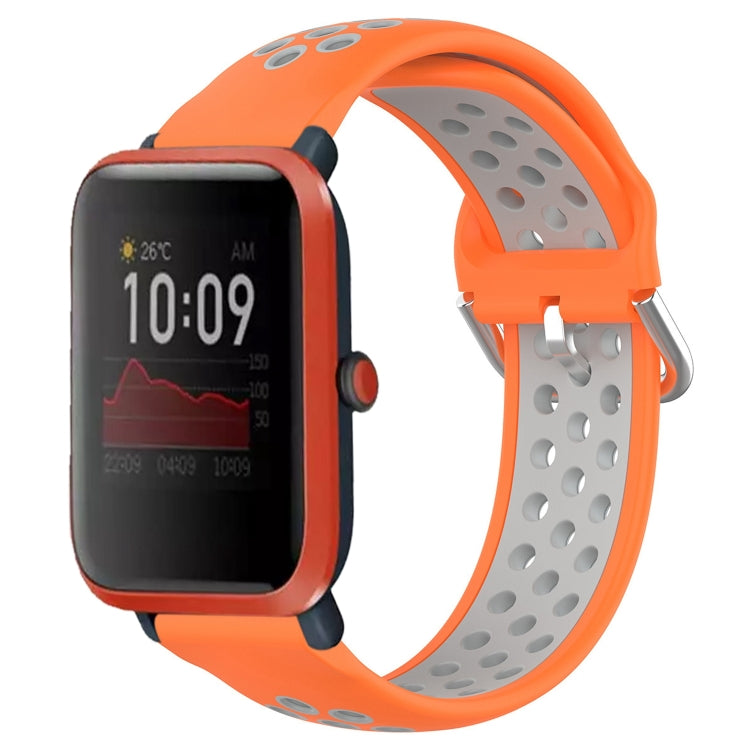 Perforated breathable silicone watch band, orange strap with gray perforations and metal clasp