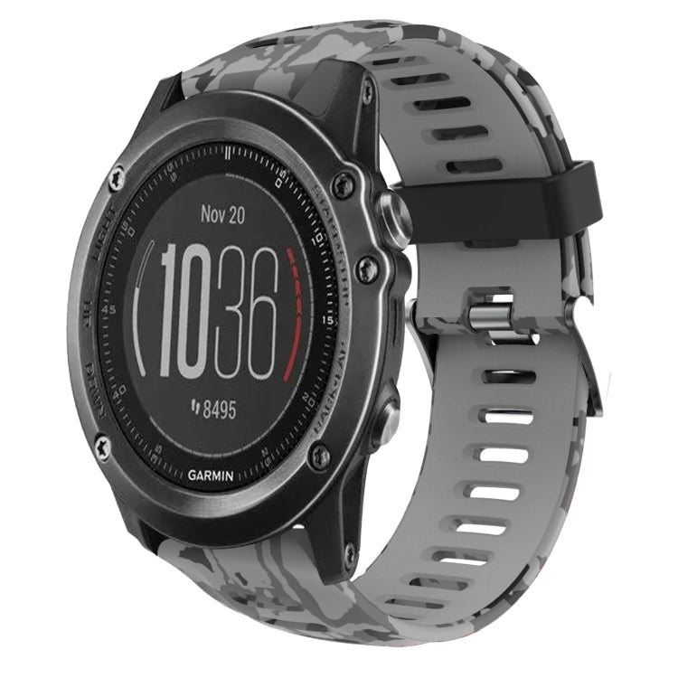 Camouflage silicone watch band with dark gray and black print, perforated strap