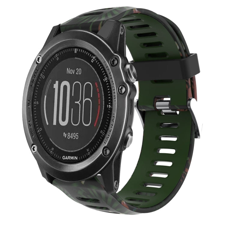 Camouflage silicone watch band with dark green camo print, perforated strap