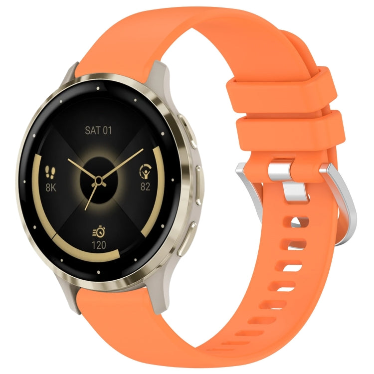 Liquid glossy orange silicone watch band with silver buckle, adjustable fit holes