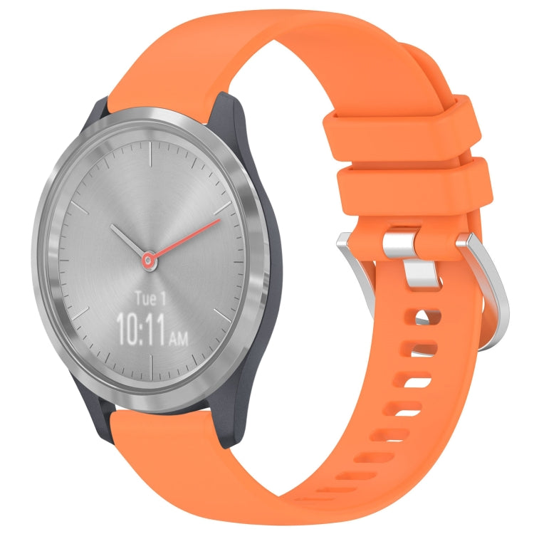 Glossy buckle silicone watch band in orange, with silver-toned clasp.