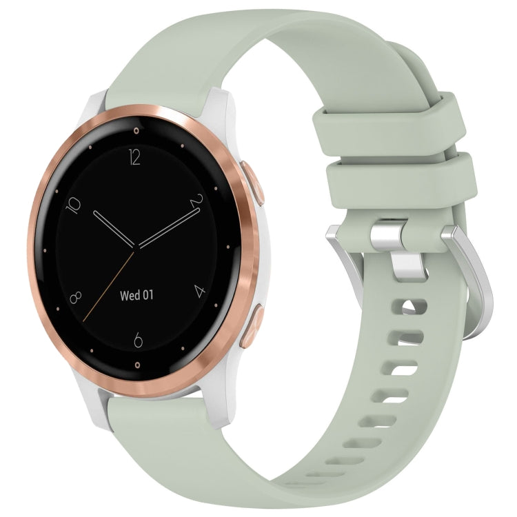 Glossy silicone watch band in green with silver buckle and adjustable clasp