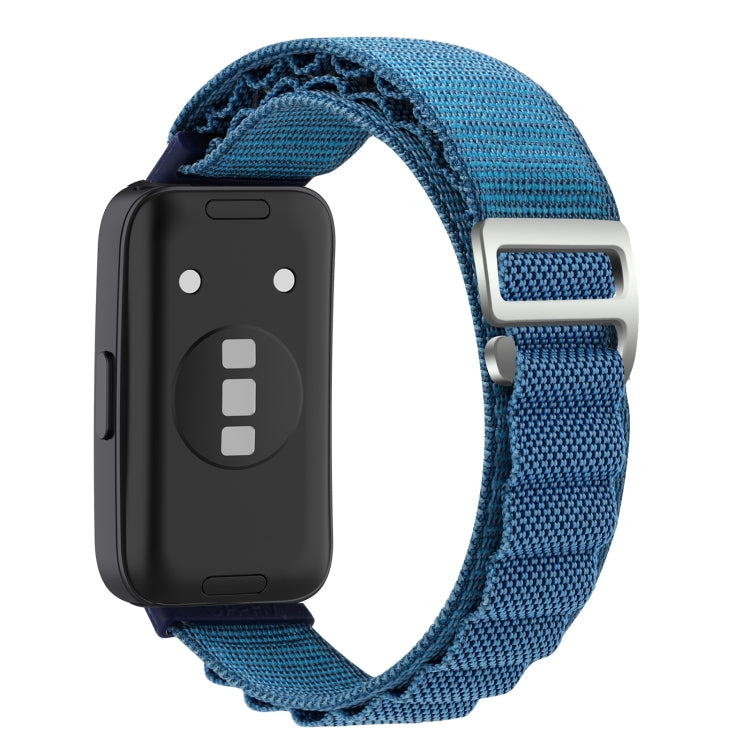 Blue nylon loop watch band with metal buckle and smartwatch sensor side visible.