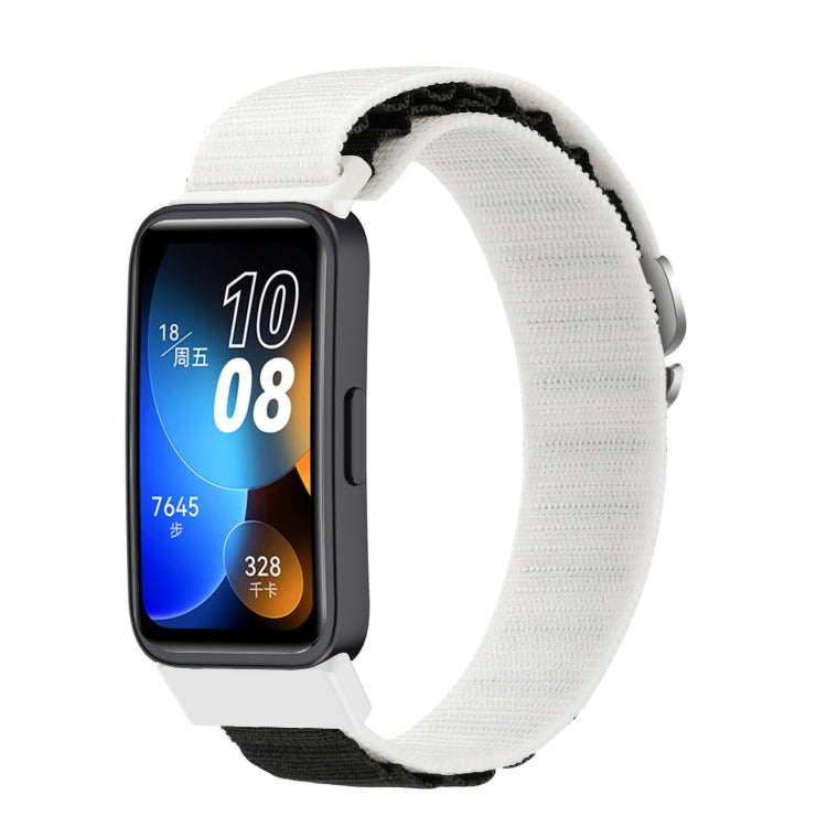 White nylon loop watch band with black hook-and-loop fastening.