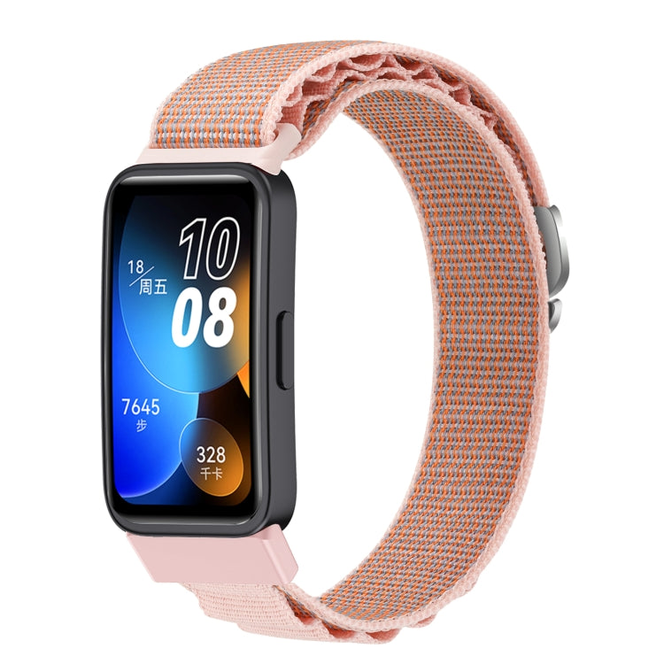Peach and gray woven nylon loop watch band fitted to a smartwatch.
