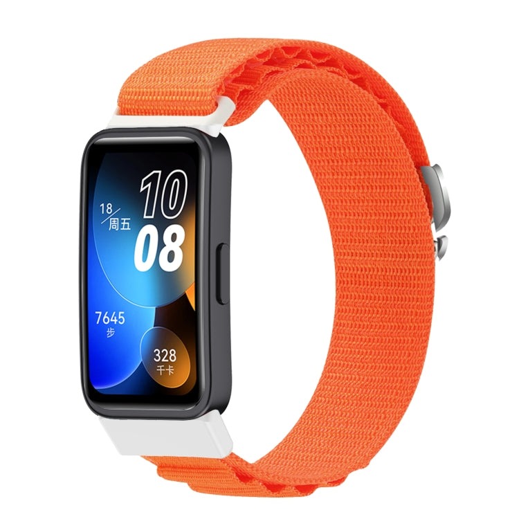 Bright orange nylon loop watch band fitted to a smartwatch.