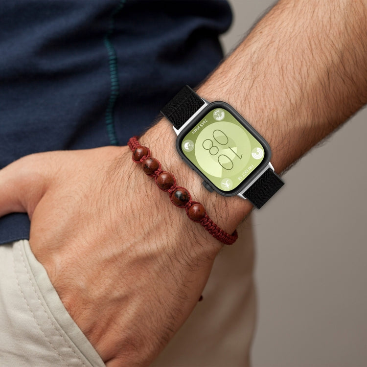 Black elastic nylon band fitted to a Huawei Watch Fit 3 on a wrist