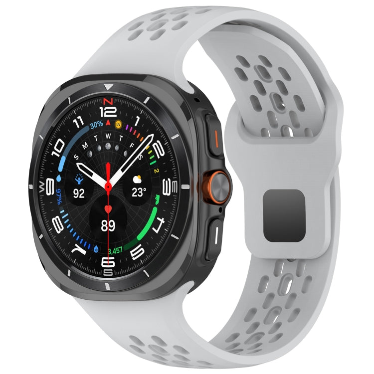 Light gray silicone watch band with perforations and square buckle, shown attached to a smartwatch