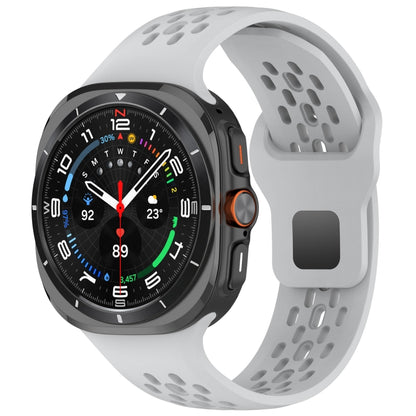 Light gray silicone watch band with perforations and square buckle, shown attached to a smartwatch