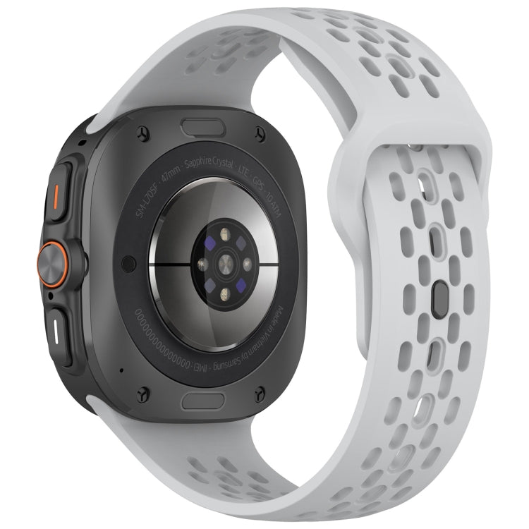 Light gray perforated silicone watch band attached to a smartwatch, shown from the back