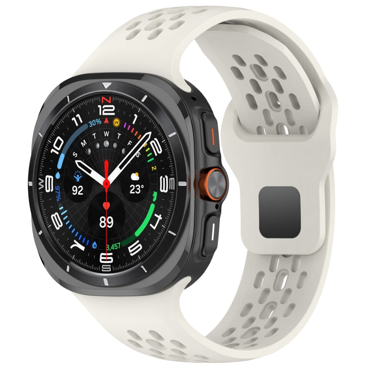 Cream white perforated silicone watch band with square buckle, attached to a smartwatch