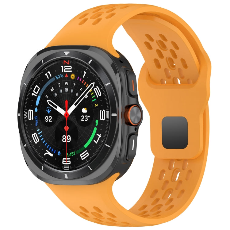 Orange perforated silicone watch band with square buckle, attached to a smartwatch
