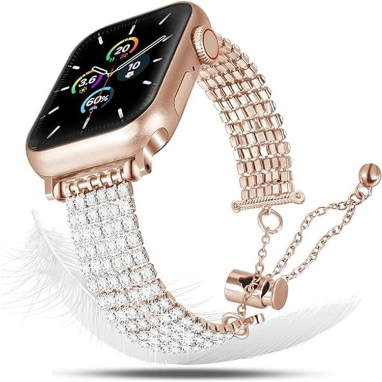 Rose gold Apple Watch band with crystal rows, linked metal back, and adjustable chain clasp