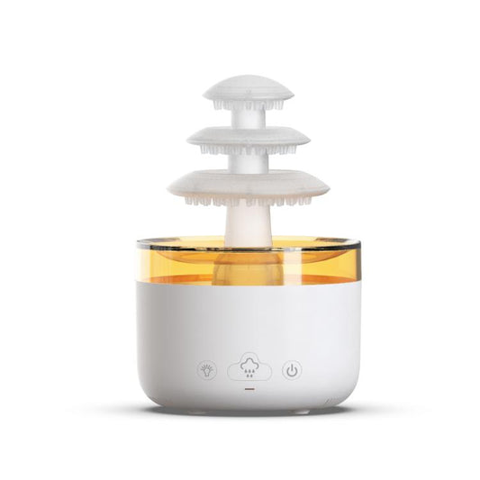 Three-color ultrasonic humidifier diffuser with white base and amber-lit water tank