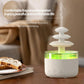 Three-color ultrasonic humidifier diffuser with white base and green-lit water tank
