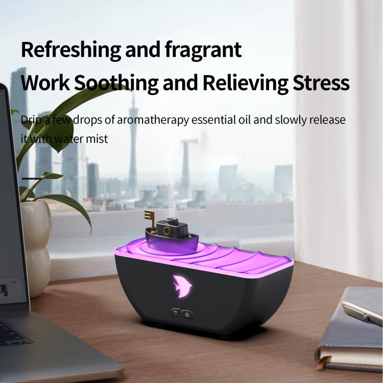 Black boat-shaped ultrasonic humidifier aromatherapy diffuser with purple LED light