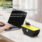 Black boat-shaped ultrasonic humidifier aromatherapy diffuser with yellow LED glow