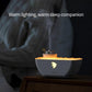 White boat-shaped ultrasonic humidifier aromatherapy diffuser with warm orange LED light