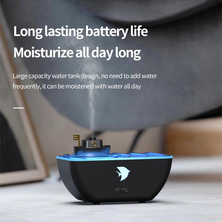 Black boat-shaped ultrasonic humidifier aromatherapy diffuser with blue LED glow
