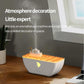 White boat-shaped ultrasonic humidifier aromatherapy diffuser with orange LED light