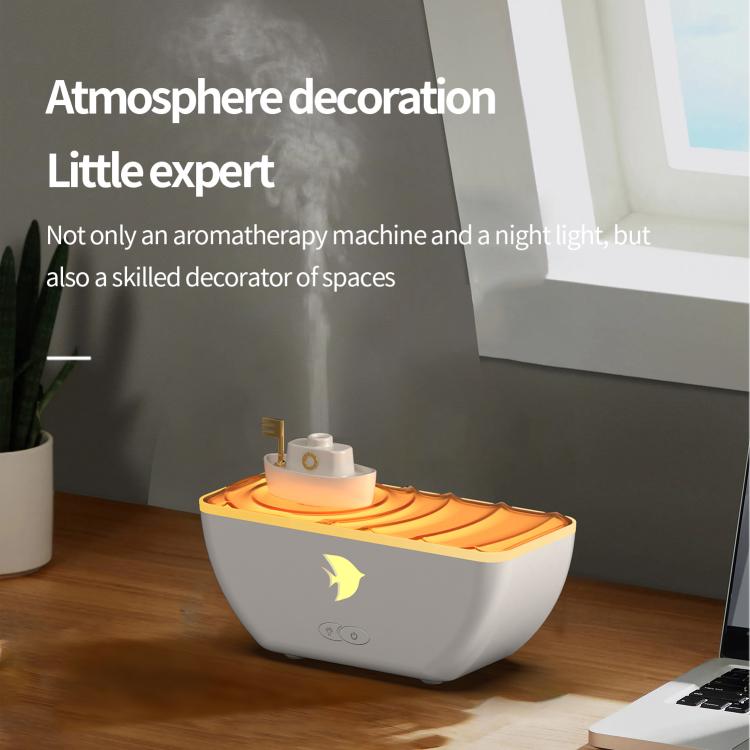 White boat-shaped ultrasonic humidifier aromatherapy diffuser with orange LED light