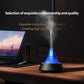 Ultrasonic humidifier diffuser with glowing blue light on dark base