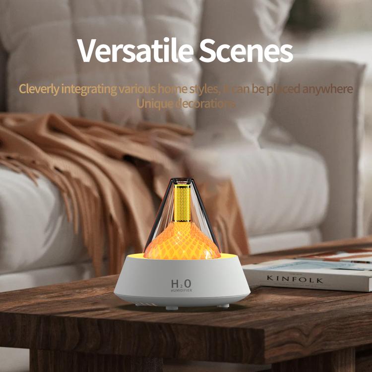 White ultrasonic humidifier diffuser with glowing orange light and H2O label on base