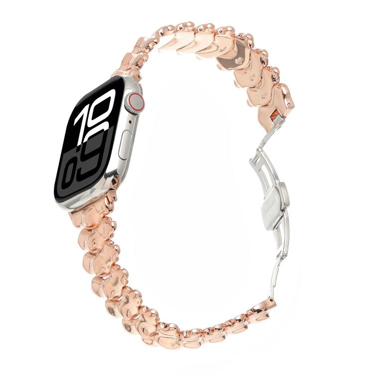 Rose gold dragon spine metal watch band with butterfly clasp, shown attached to a smartwatch