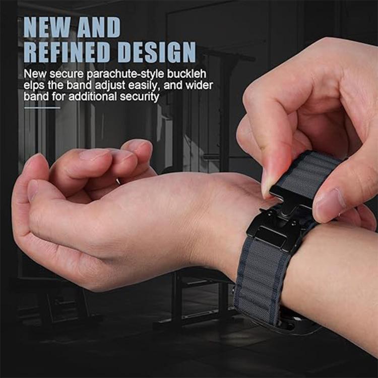 Dark ribbed nylon watch band being fastened around a wrist