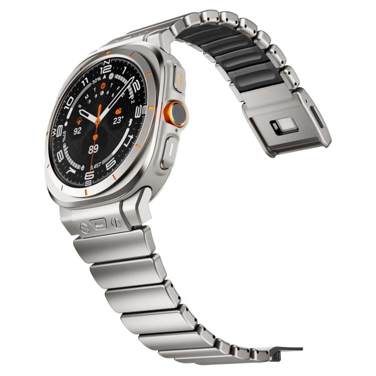 Silver smartwatch band with black silicone inserts and an open magnetic clasp